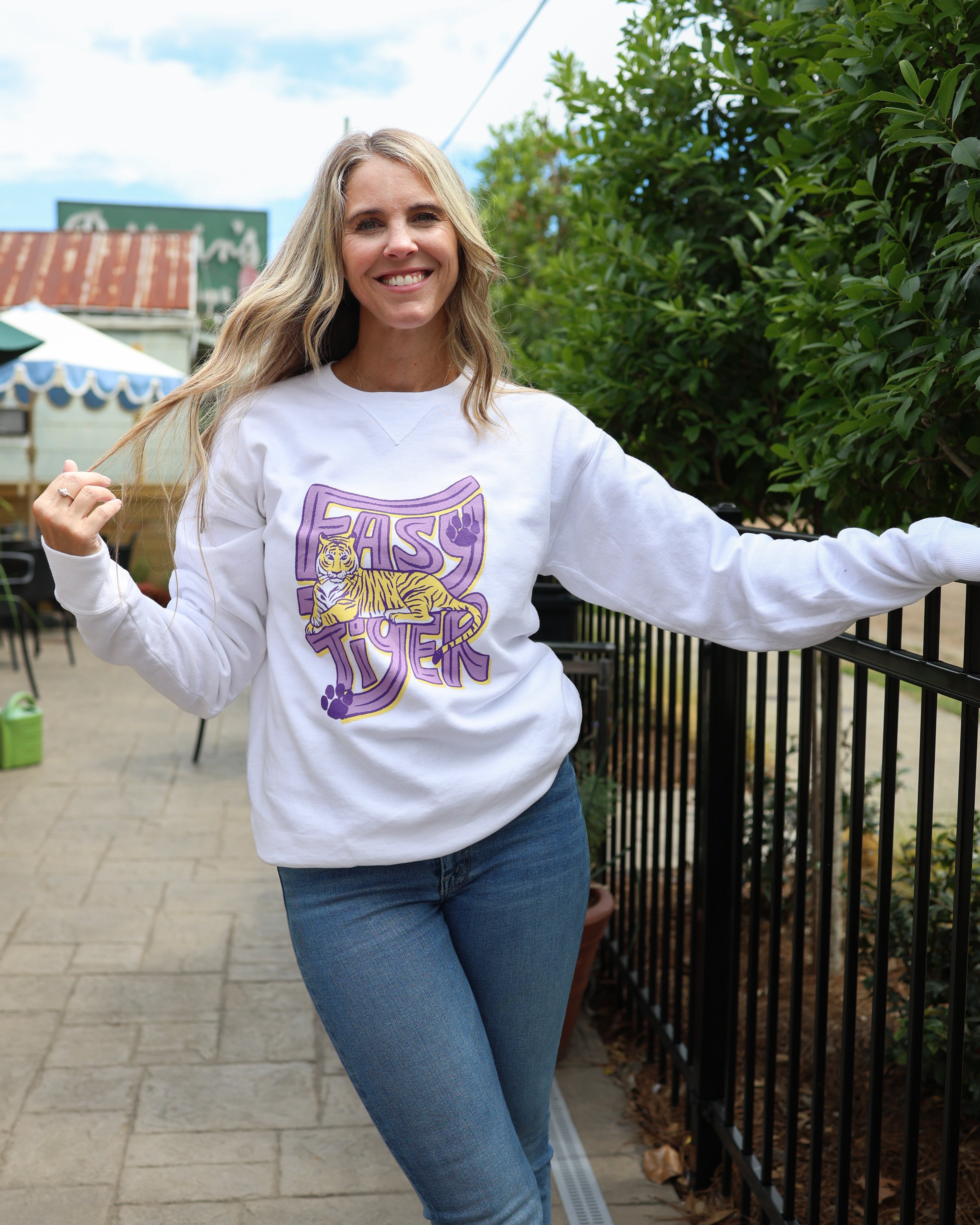 White Sweatshirt with the words Easy Tiger 