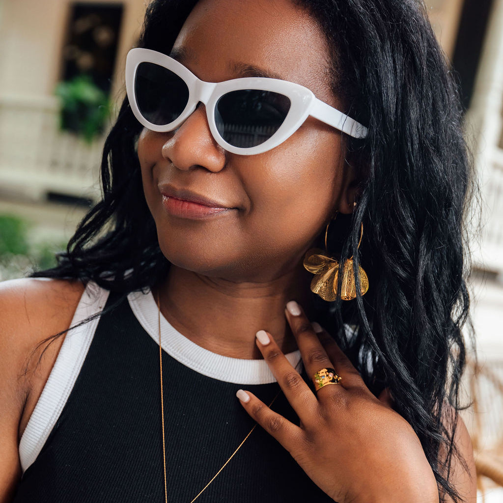 Inez Earrings worn, lightweight gold floral hoops by Steward & James